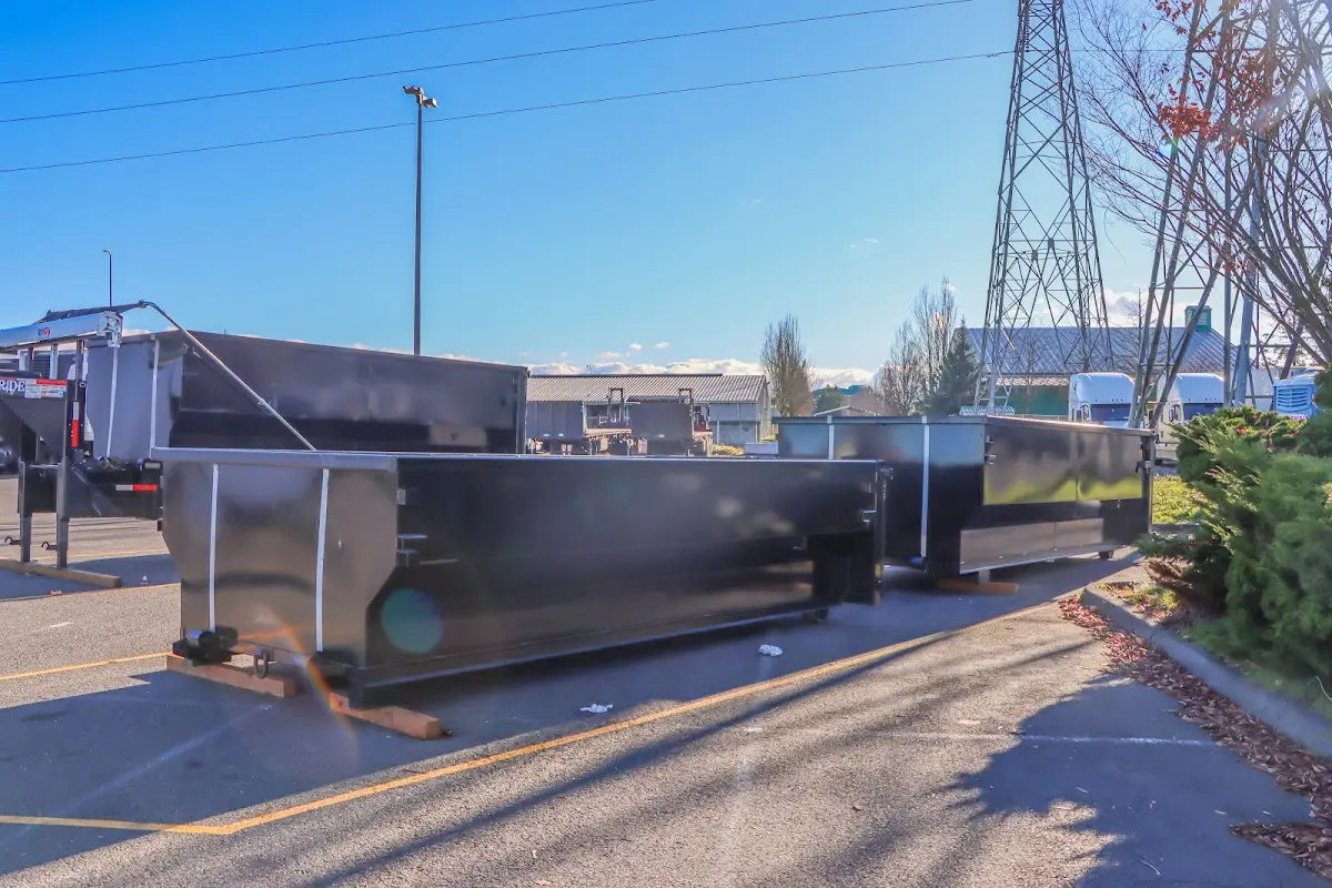 Roll-off dumpster ready for waste disposal at job site for 15 Yard Dumpster Rental in Franklin